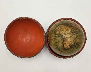 A small miniature terrestrial pocket globe